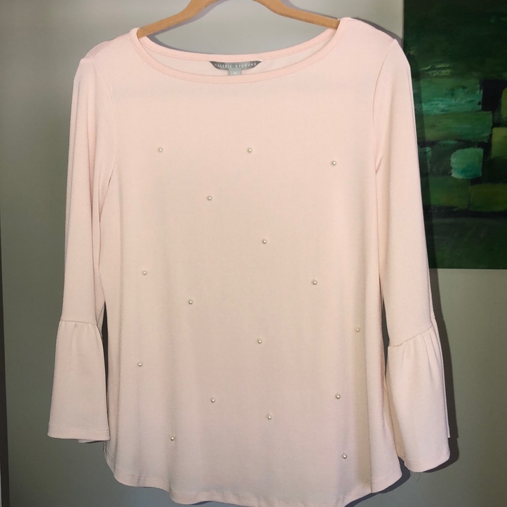 Pink with pearl embellishments. Valerie Stevens.
